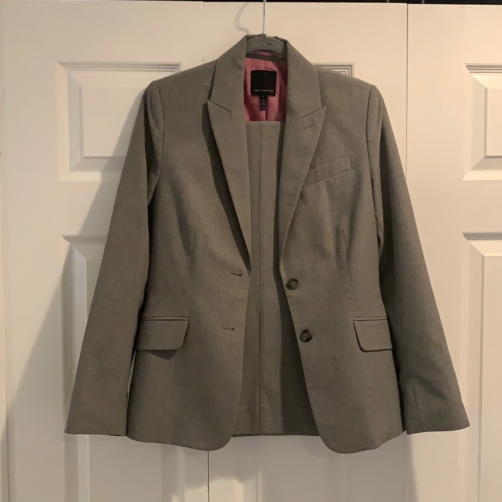 The limited grey suit size 6